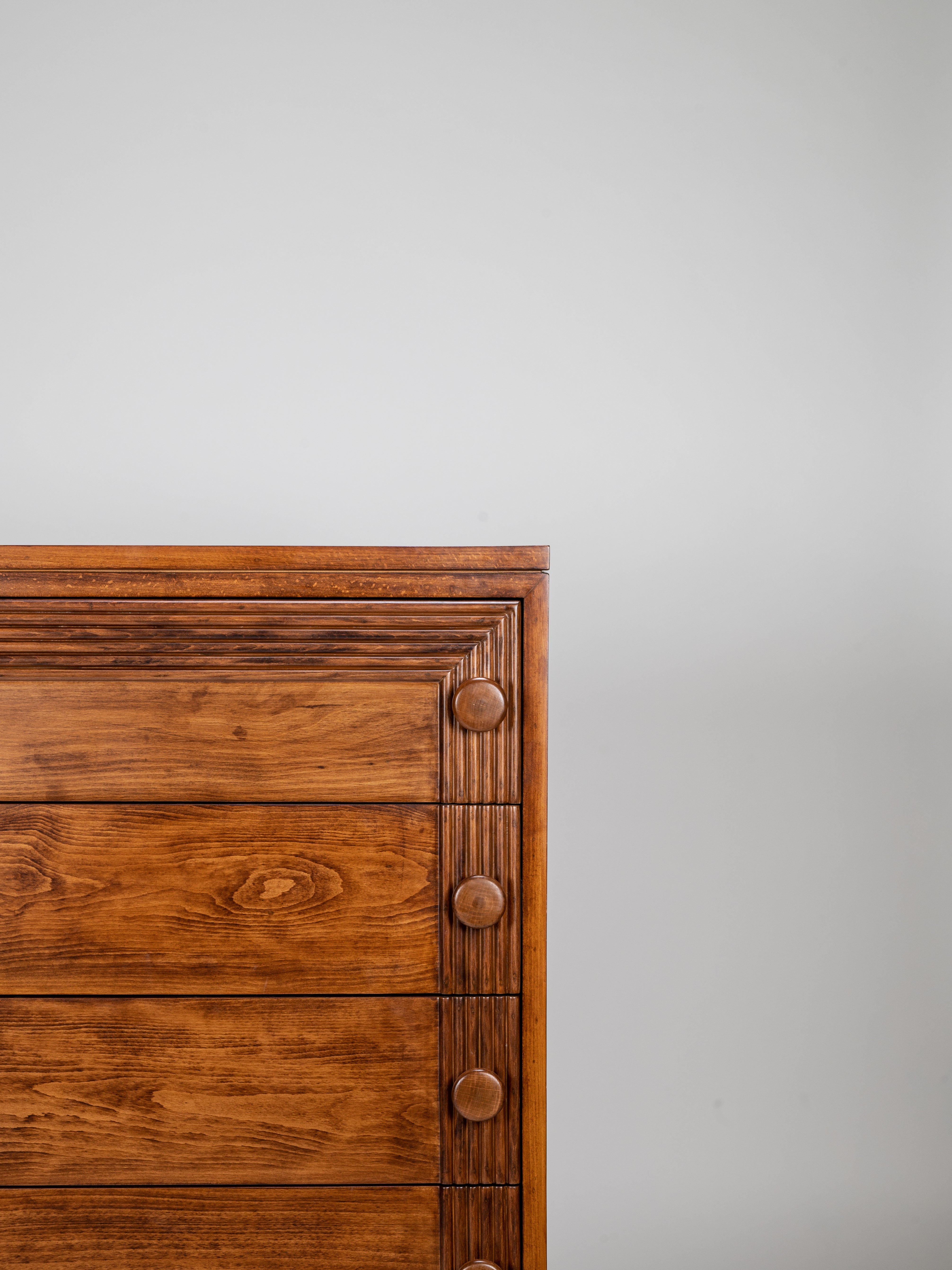 Wooden dresser with a plain background