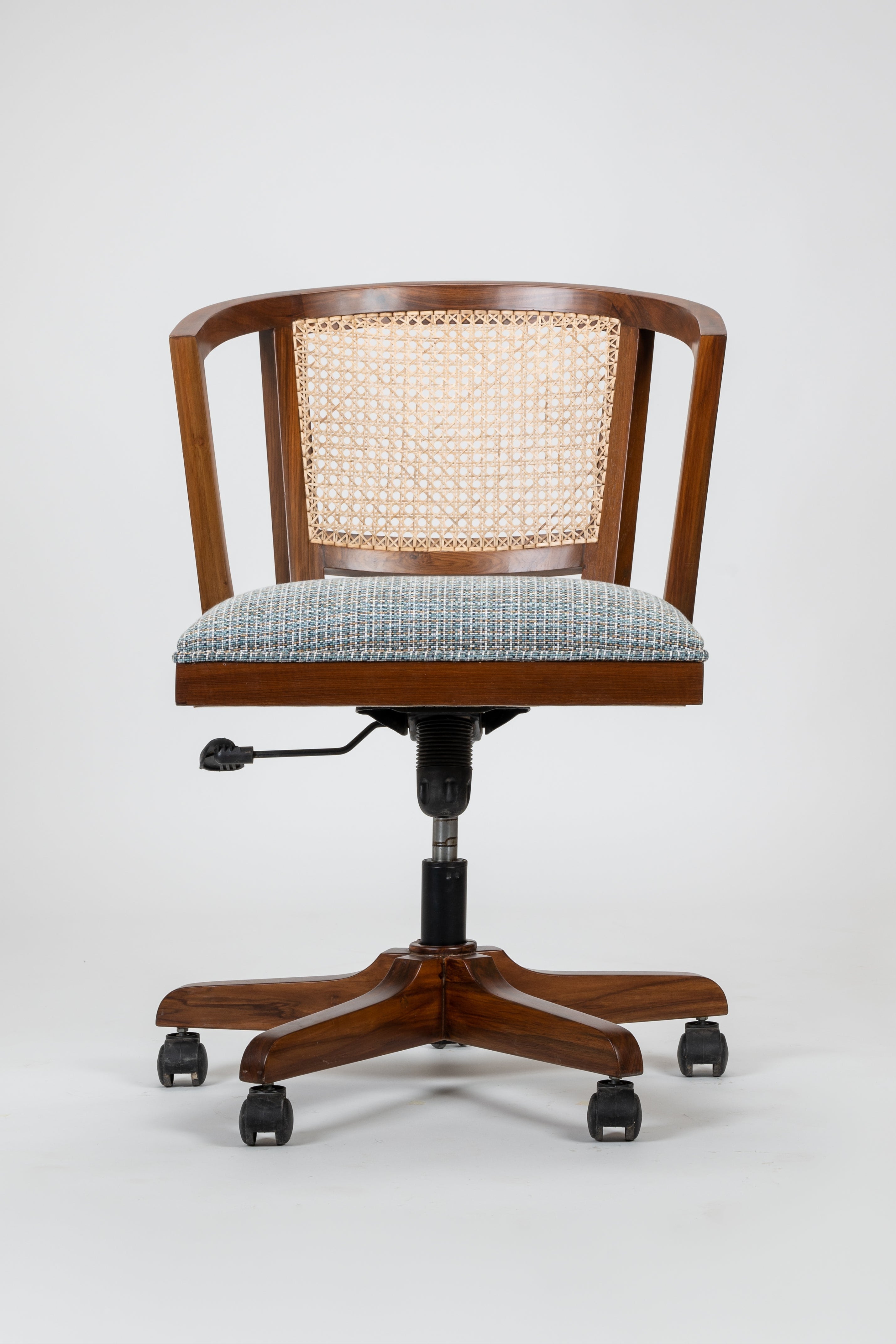 Wooden office chair with woven backrest and upholstered seat on a white background