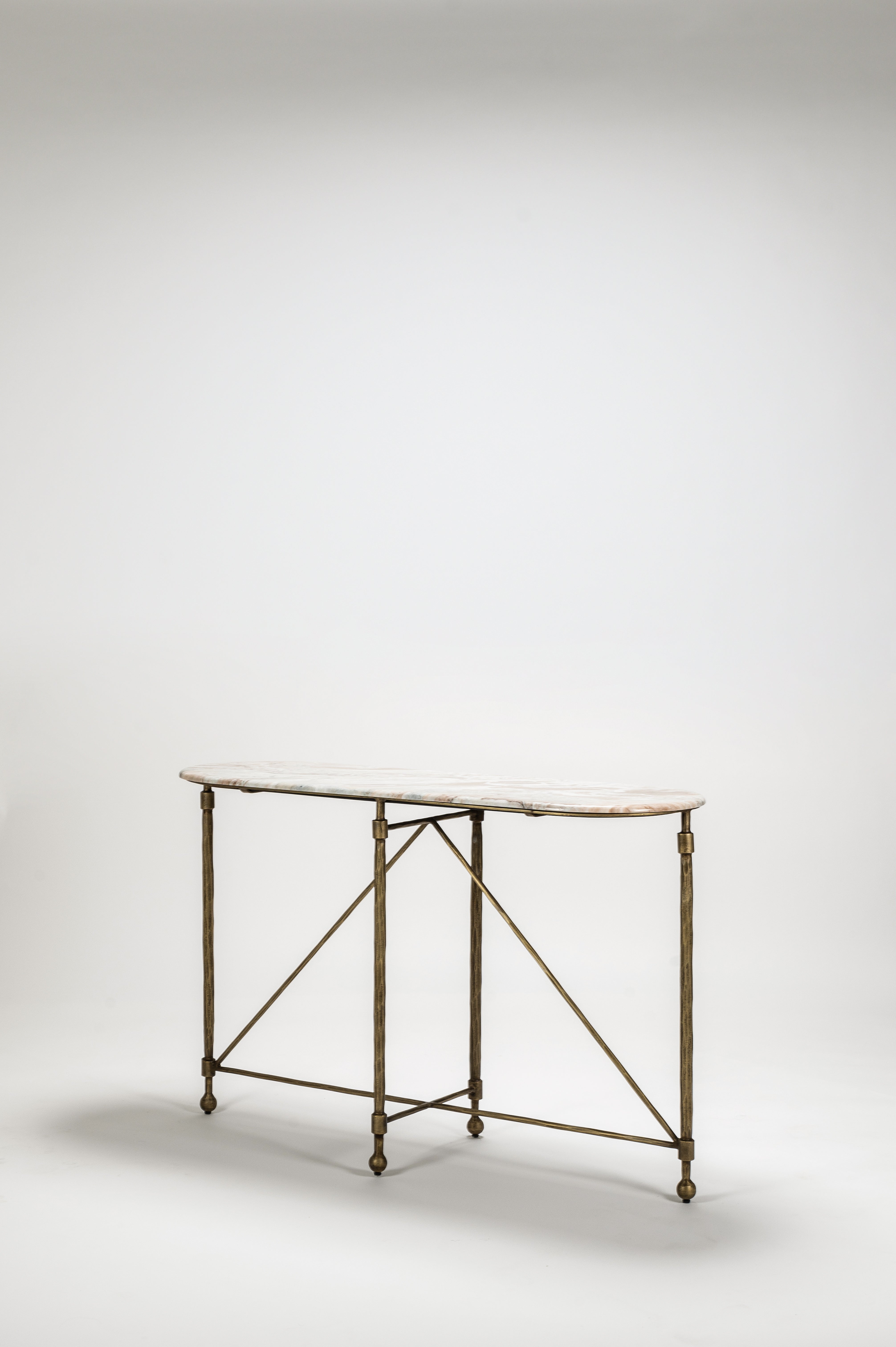 Bronze console table on a white background