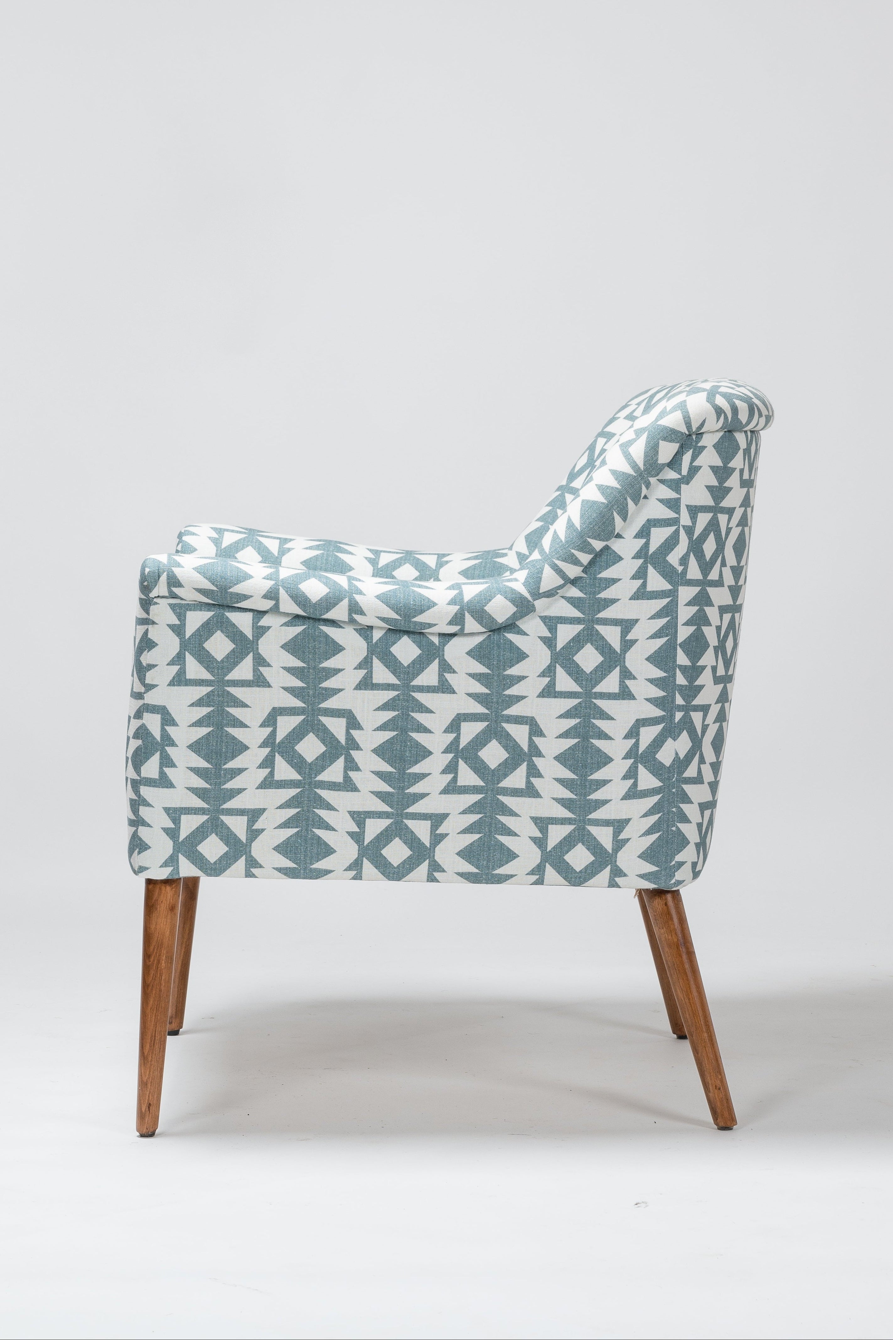 Chair with a patterned fabric cover on a white background