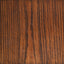 Close-up of a wooden surface with a rich brown color and visible grain pattern.
