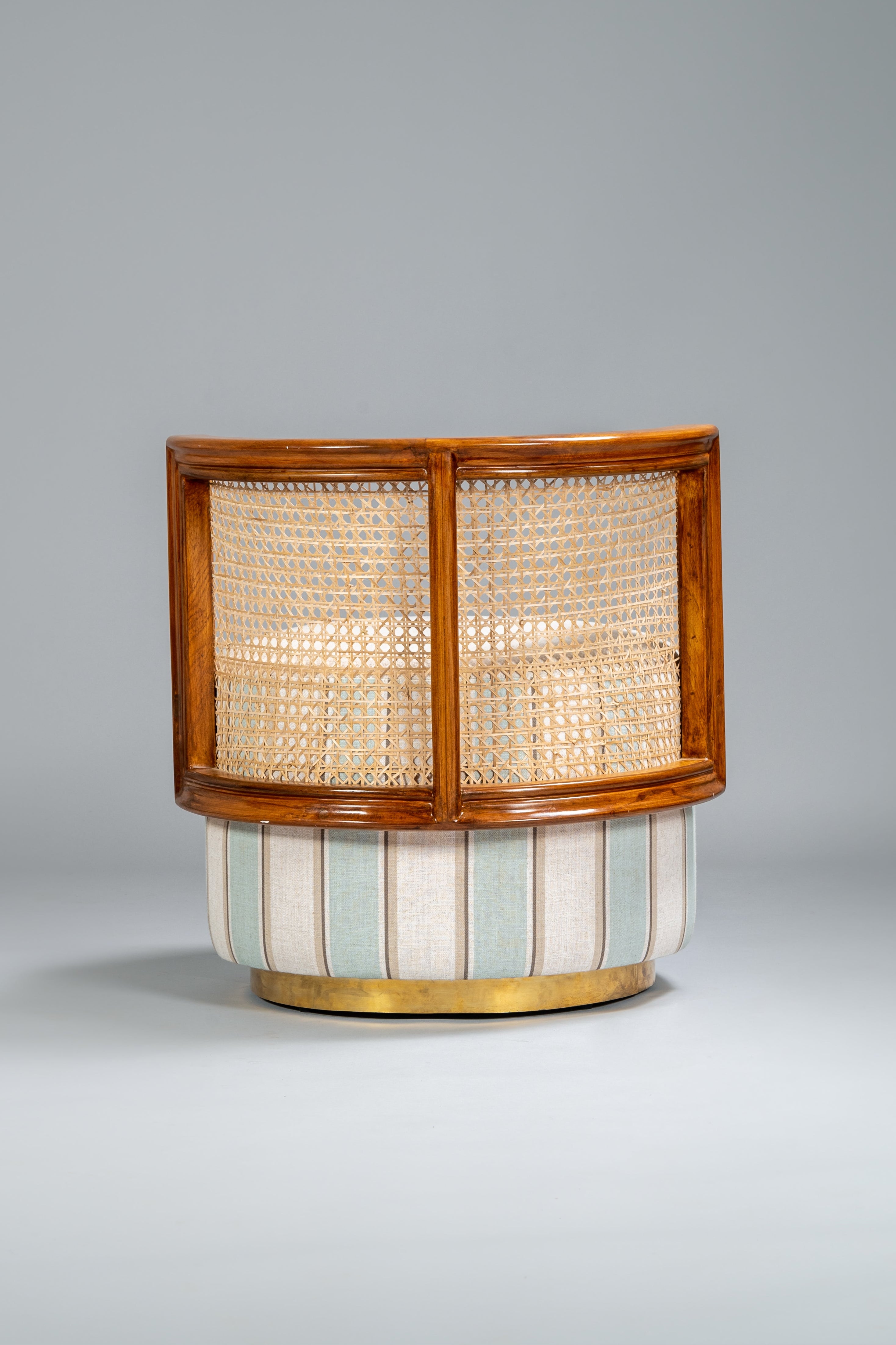 Decorative lamp with wooden and wicker design on a gray background