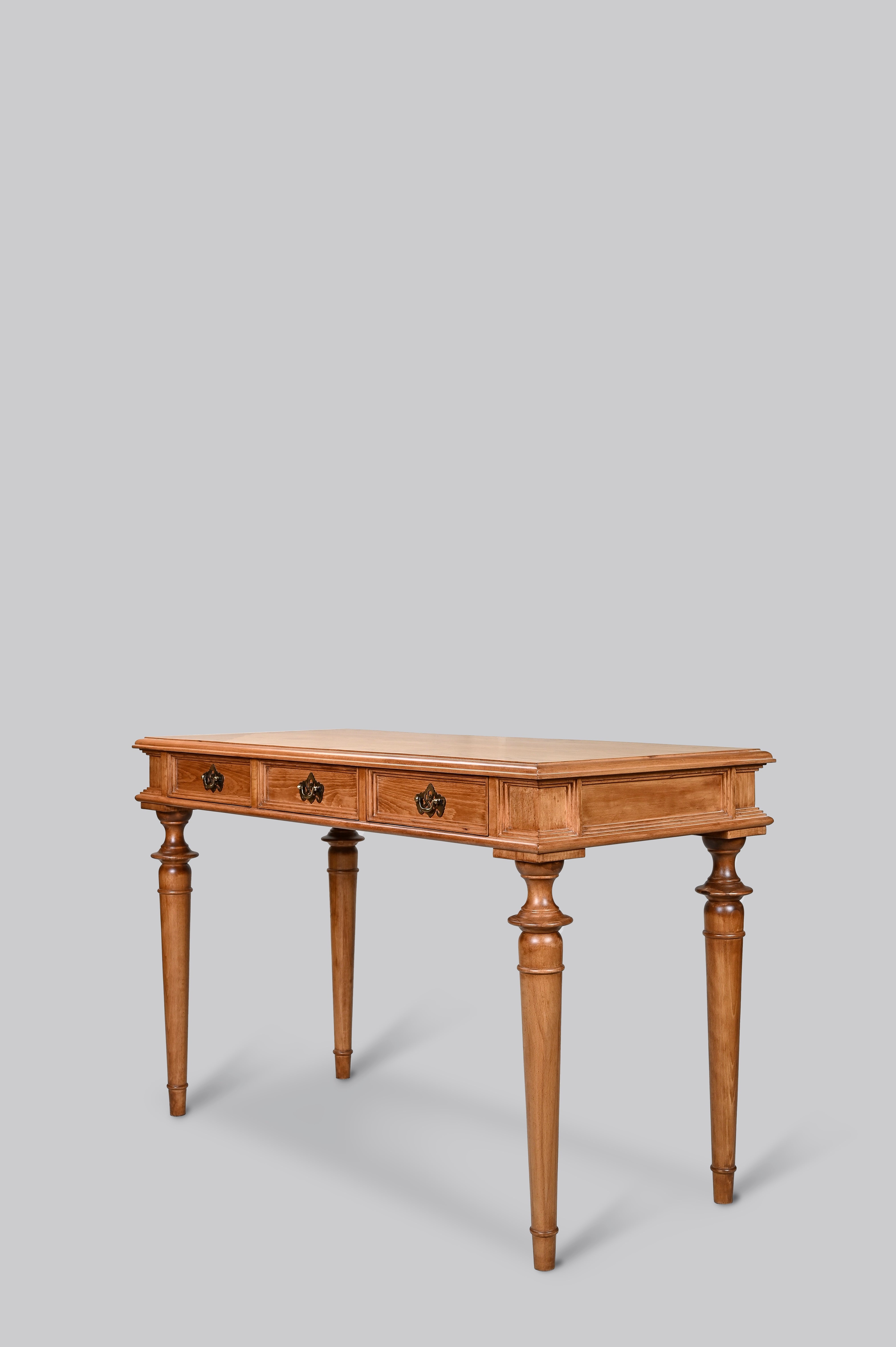 Wooden console table with two drawers on a gray background