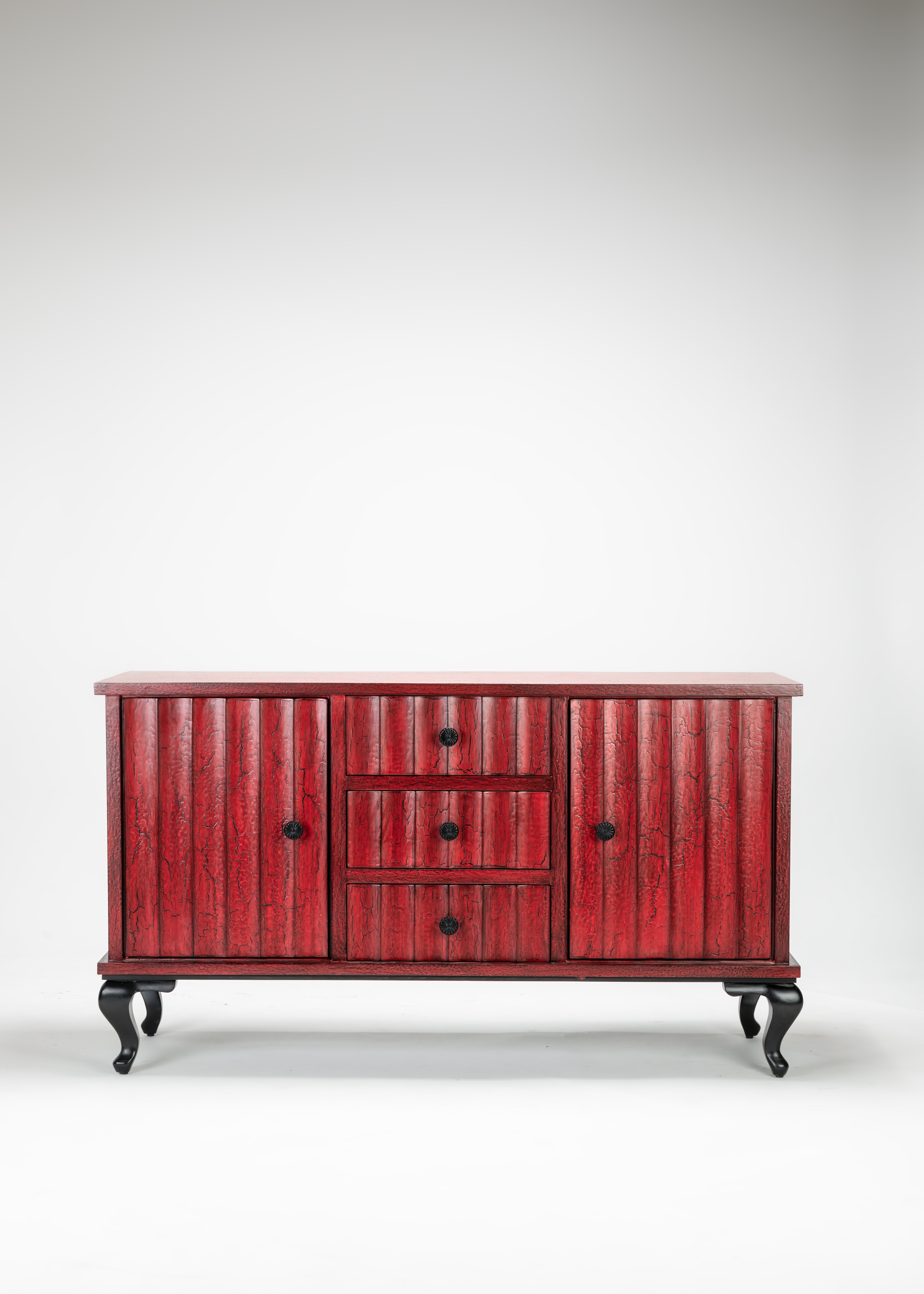 Red wooden sideboard with a white background