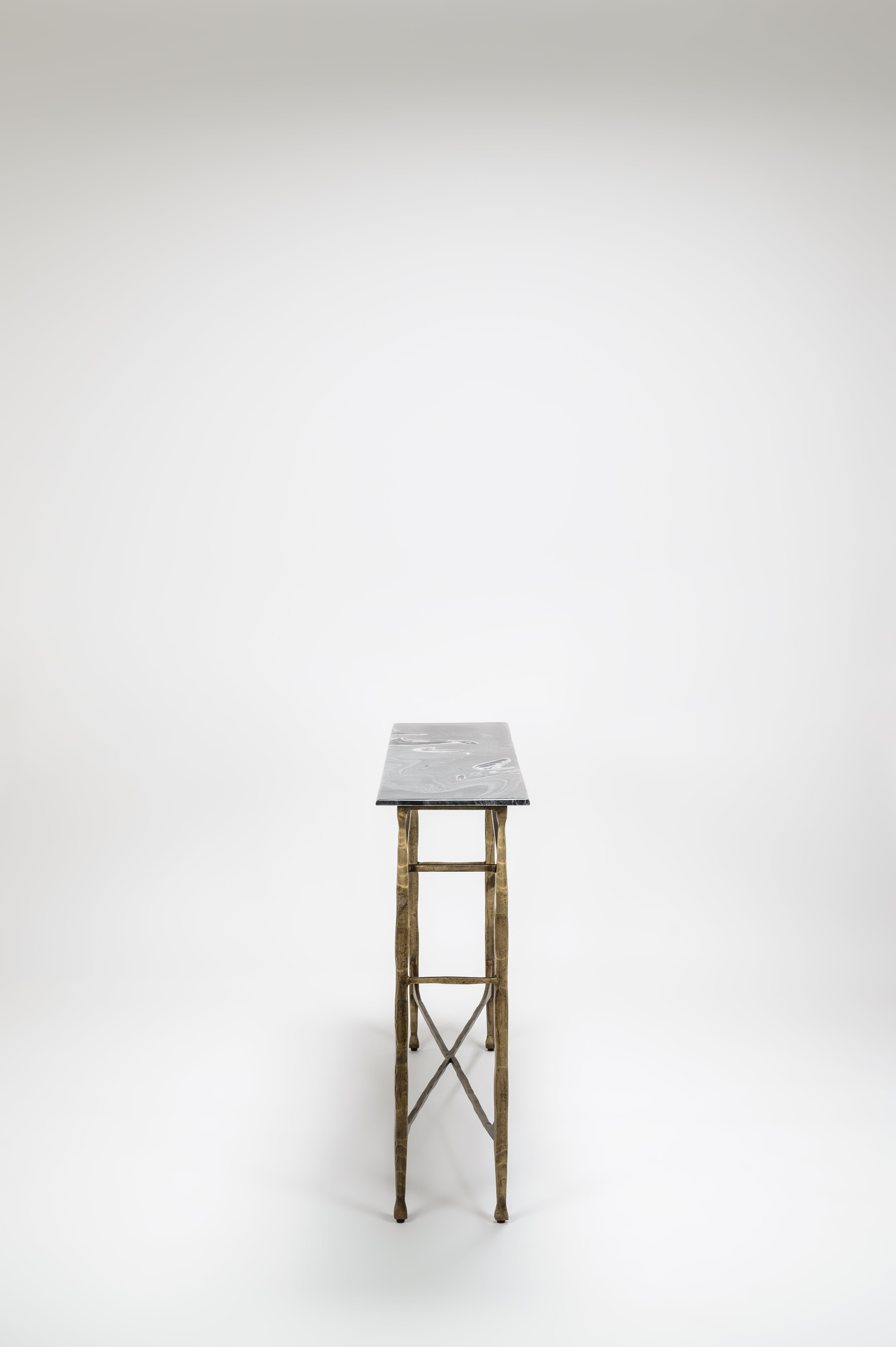 Tall stool with a marble top on a white background