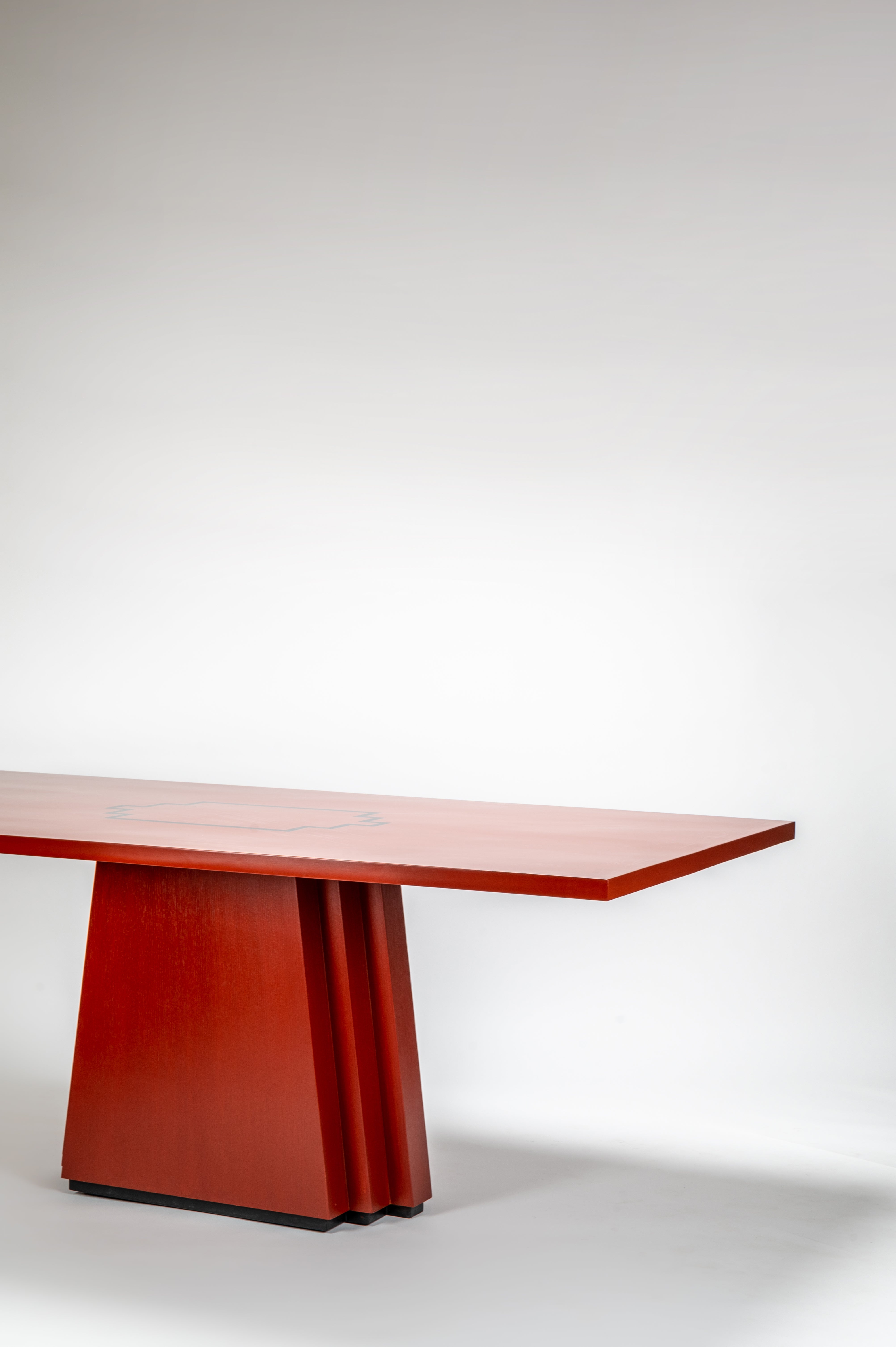 Red dining table on a white background
