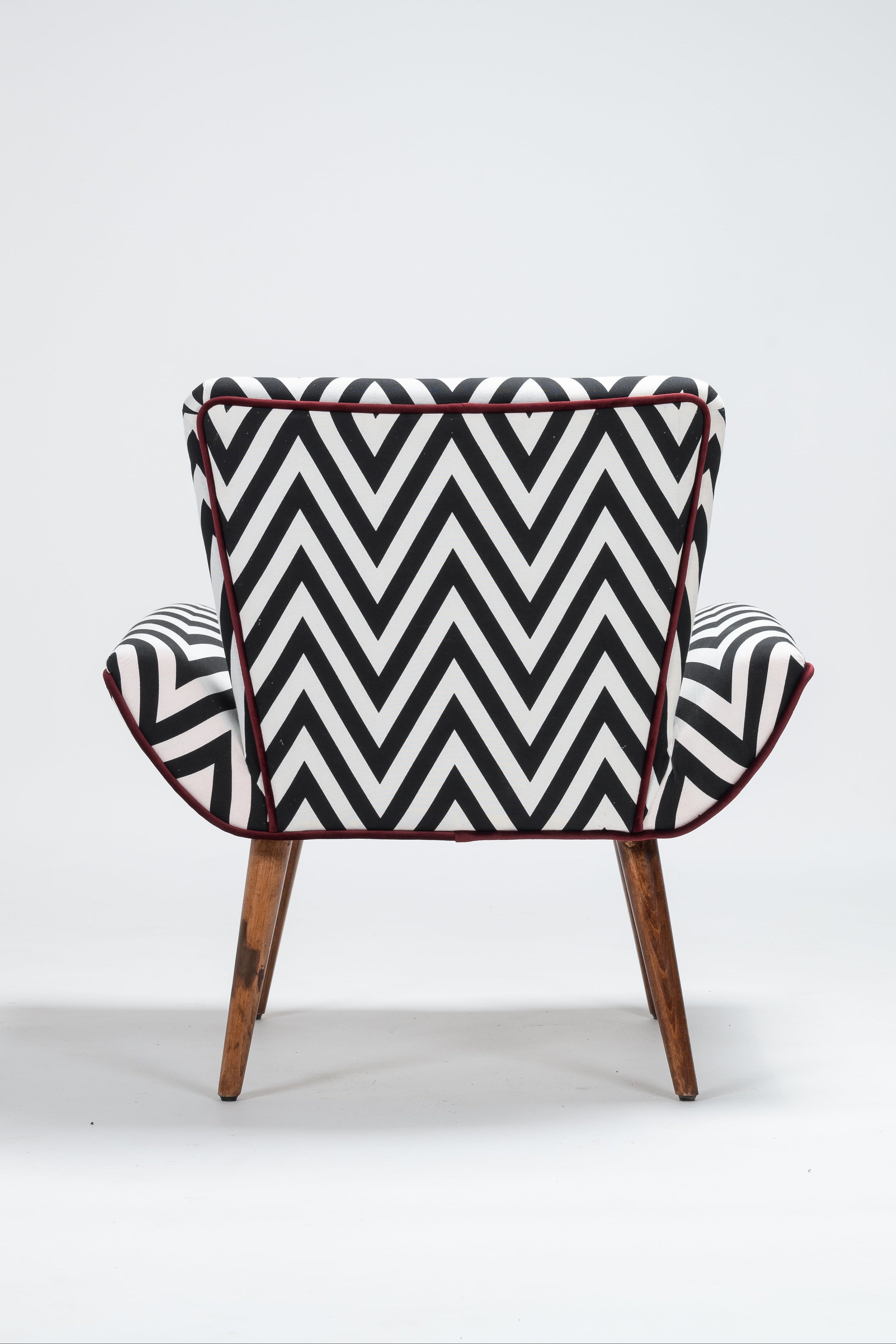 Chair with black and white zigzag pattern on a white background