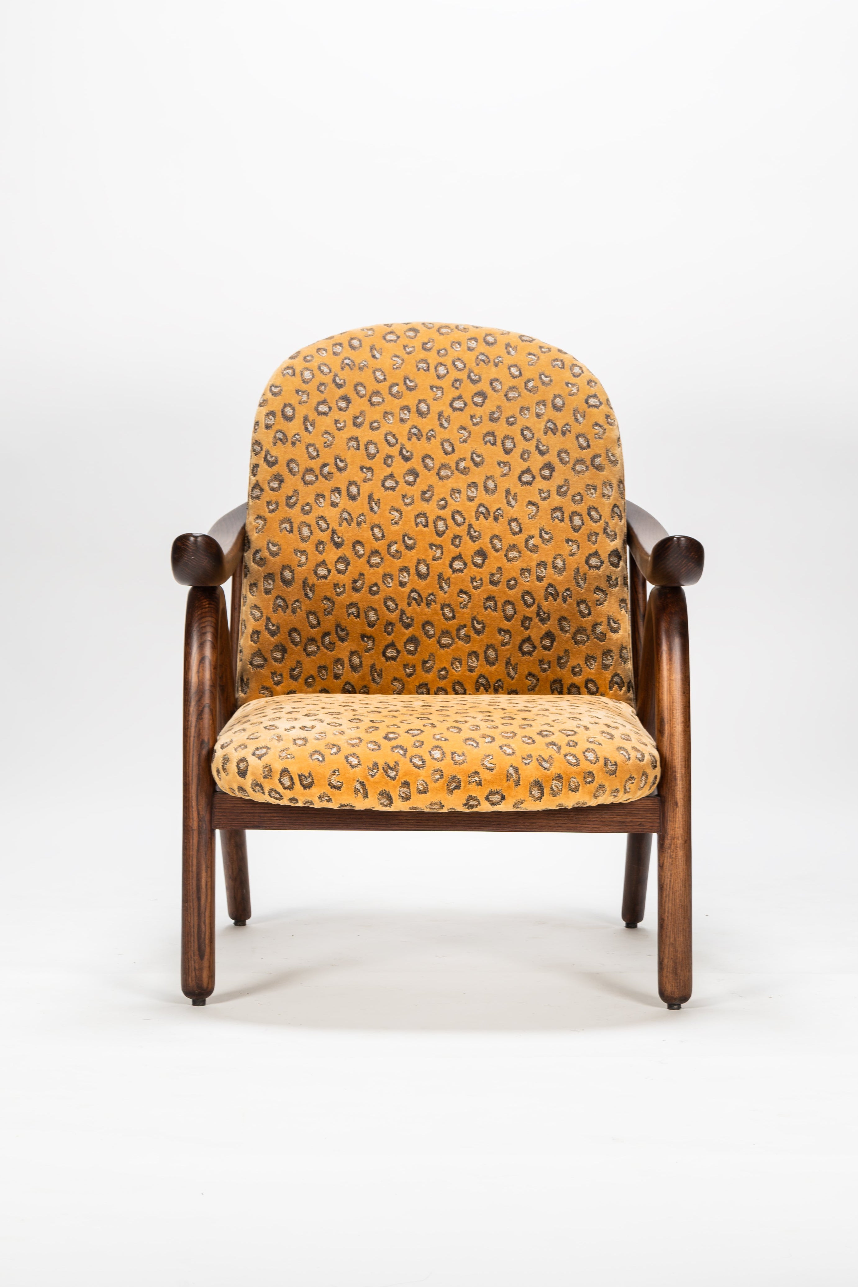Chair with patterned cushion on a white background