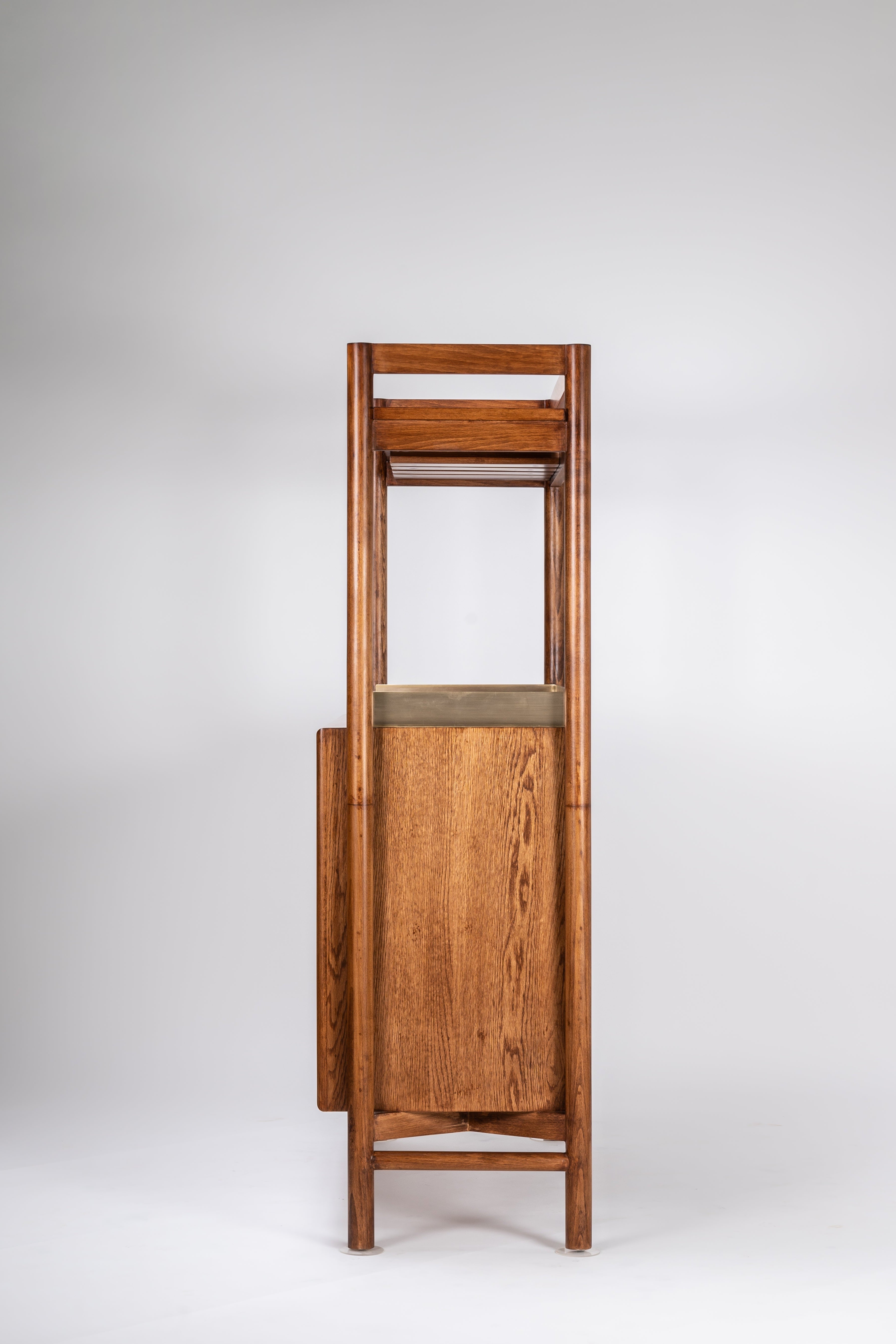 Wooden chair with a small table on a white background